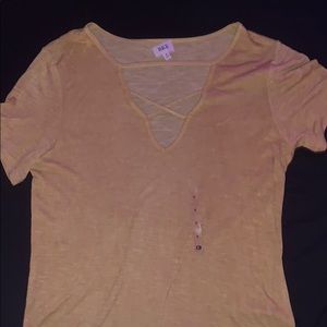 A yellow shirt never been worn